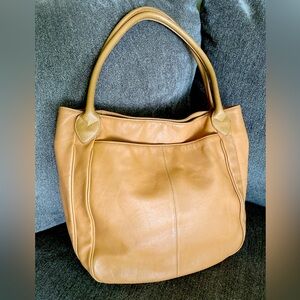 Sophia Caperelli tan leather tote bag 3 compartments, 2 slip & 1 zipper pockets.